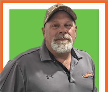 Kevin Woodard for SERVPRO photo on white wall
