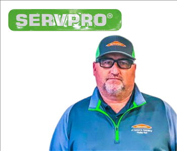 Jeff Williams for SERVPRO photo on white wall
