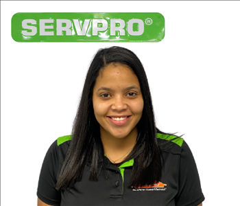Patricia Delgado - Female Crew Chief with SERVPRO uniform in front of white wall