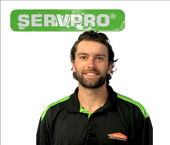 Harrison Batt, Green SERVPRO sign, employee