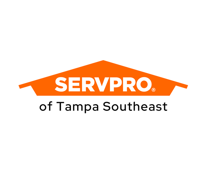 Orange SERVPRO of Tampa Southeast logo, orange and white and black house