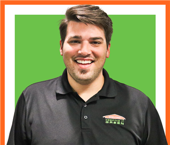 Gavin Parchman for SERVPRO photo on white wall